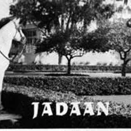 Two great horses. Jadaan visits the statue of the immortal Seabiscuit at Southern California's famous Santa Anita race track. A special platform was built in the midst of one of Santo Anita's noted pansy beds for this occasion. 

