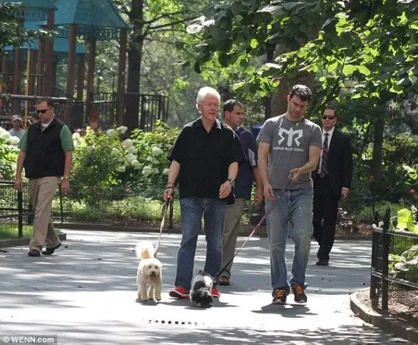 Bill Clinton has father-son bonding time with pregnant Chelsea's husband Marc as they walk their dogs in New York City

Read more: http://www.dailymail.co.uk/news/article-2718134/Bill-Clinton-father-son-bonding-time-pregnant-Chelsea-s-husband-Marc-walk-