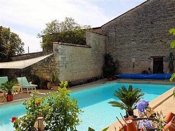 9 bedroom Manor House in Neuvicq Le Château, Poitou-Charentes for sale with 20674m2 of land. Asking just $870,048 USD