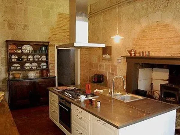 Magnificent former priory dating from the 11th century set in an enclosed park with beautiful mature trees. Now just $889,200 US